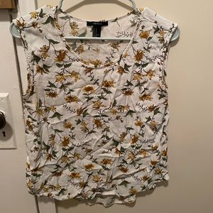 White top with yellow floral details